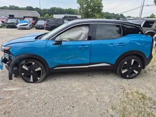 2025 Nissan Kicks SR Intelligent AWD - Exterior Side Driver Image
